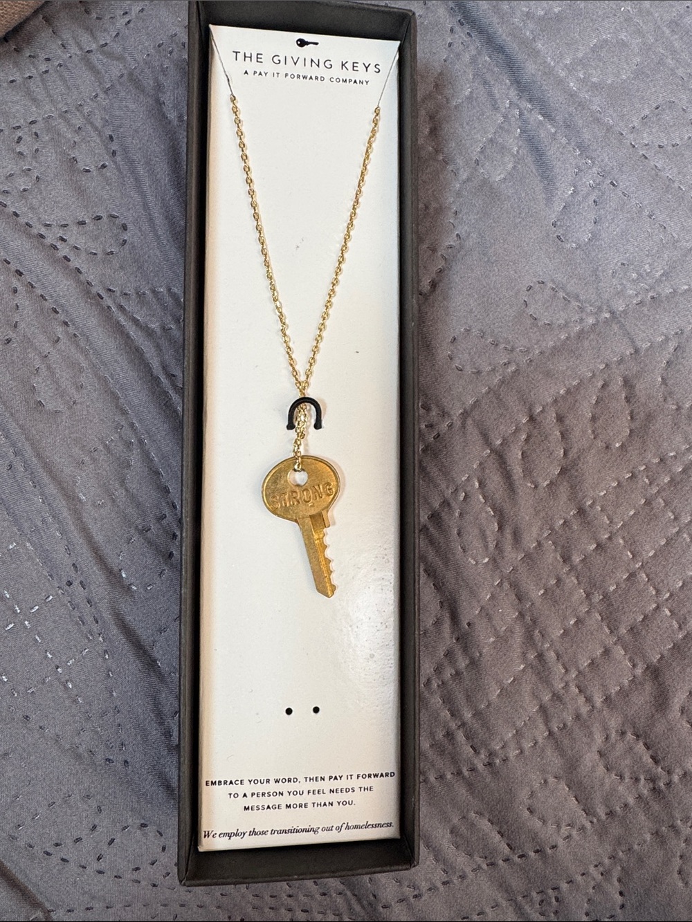 The Giving Keys Gold 'STRONG' Key Necklace with Black Accent